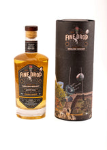 Load image into Gallery viewer, A bottle of The Fine Drop Margaux Cask Finish English Single Malt Whisky (46% ABV), seen here on a white background accompanied by its presentation tube. Celebrating the iconic drop goal that saw the men's team of England Rugby become World Champions in 2003