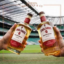 Load image into Gallery viewer, England's No.6 Rum Cask Single Malt English Whisky - The Official Whisky of England Rugby. 700ml Bottles at Twickenham held up in celebration of the best No.6's England has ever seen.